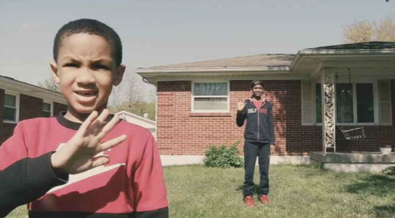 Louisville brothers hope to bring smiles to their neighbors' faces with smiley faces