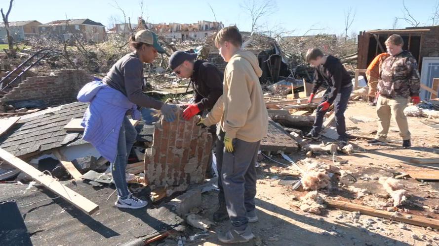 Volunteers help clean debris from properties in Warren County