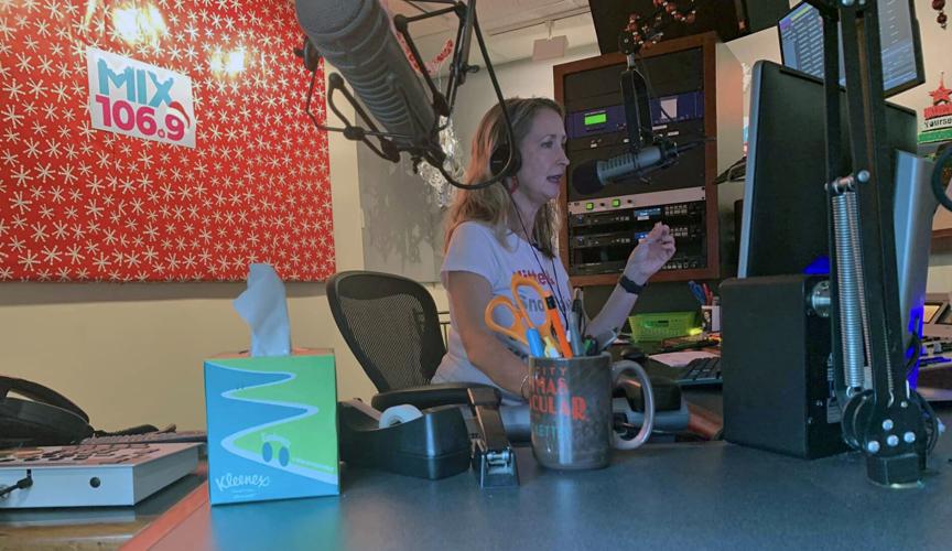 'MJ' in the studio of MIX 106.9 on Nov. 1, 2022, playing Christmas music