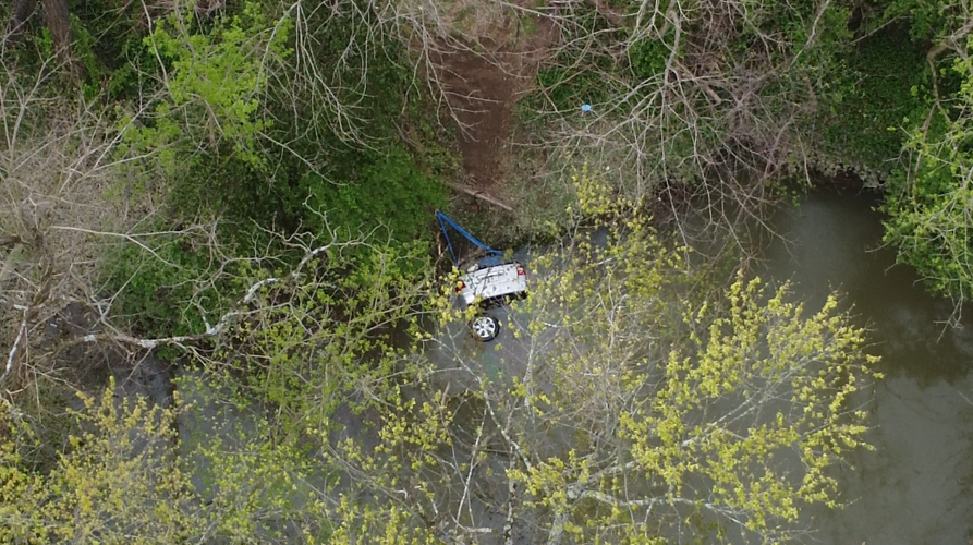 Car in the water in New Albany drone footage
