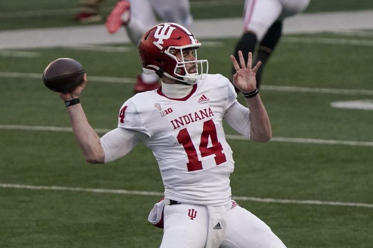 Indiana's Jack Tuttle throws a pass
