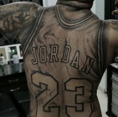 Michael Jordan-obsessed fan gets 23 jersey tattoo across entire back News w...