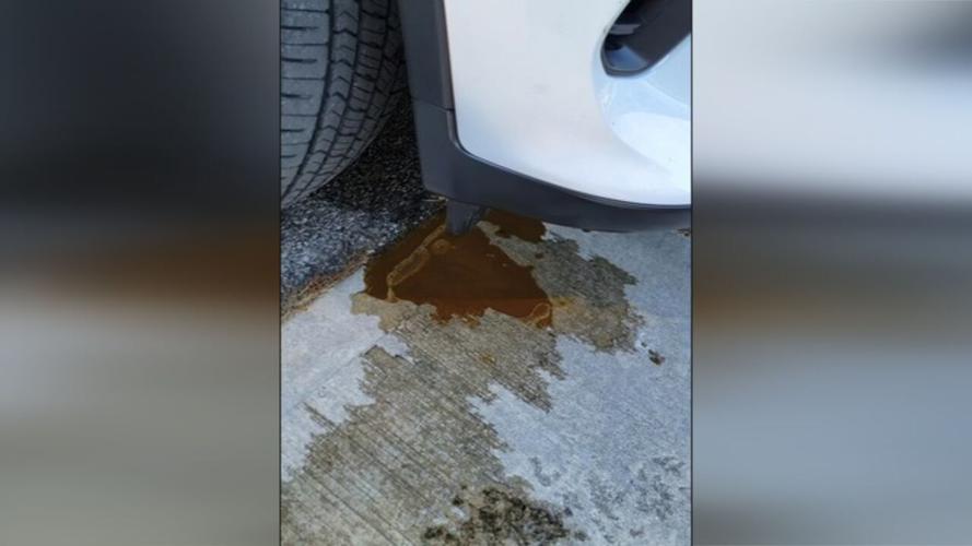 Oil on ground from leaking ISP Dodge Durango