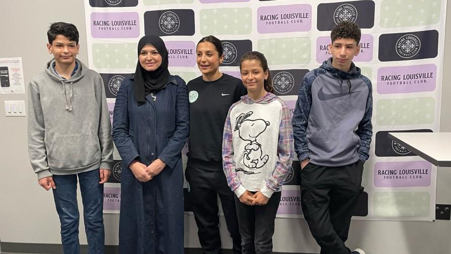 Nadia Nadim with families posing for photo