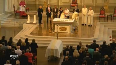 IMAGES: Faith, memories and smiles mark final farewell for John Asher