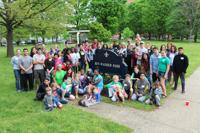 Members of Bridge Kids International gather at Ben Washer Park