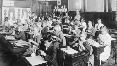 A fifth-grade class knitting for a Junior Red Cross project in Plainfield, New Jersey, in 1917 or 1918. Flu pandemic