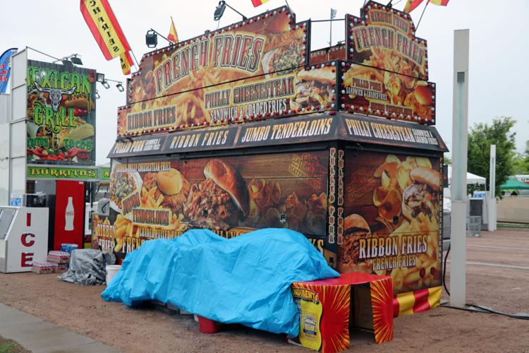 Crews set up booths along the Ohio River one day before Thunder Over Louisville 2023