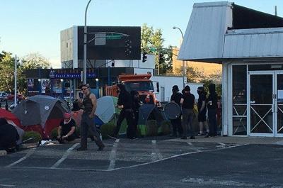 IMAGES | Crowds gather in downtown Louisville to protest over immigration laws
