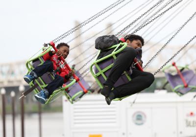 Two boys on a ride at the Chow Wagon