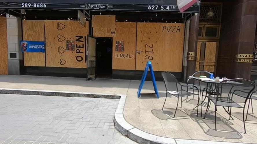 Downtown Louisville boarded up generic.jpeg