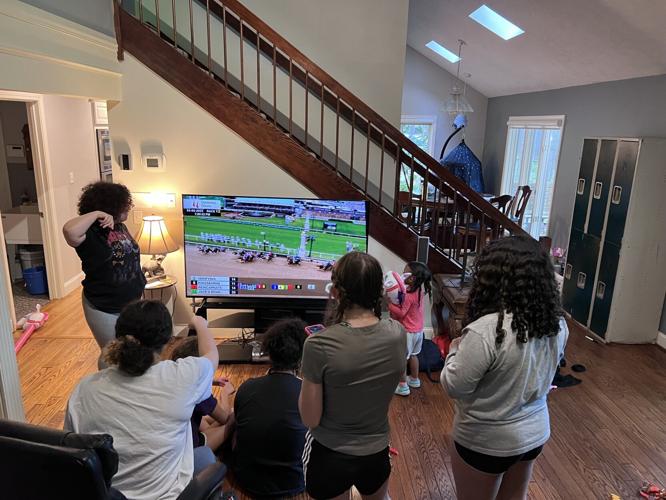 Louisville woman adopts six biological sisters from Hardin County