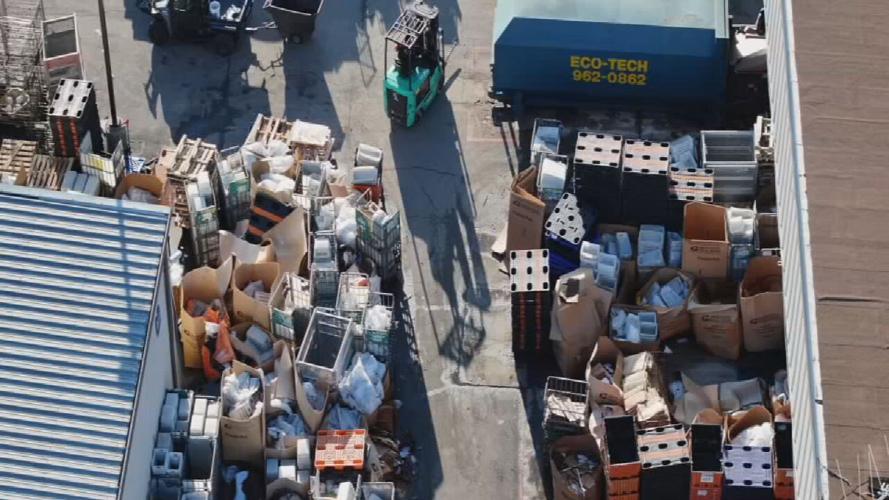 USPS delays-Gardiner Lane Louisville Regional Post Office drone-Packages piled up