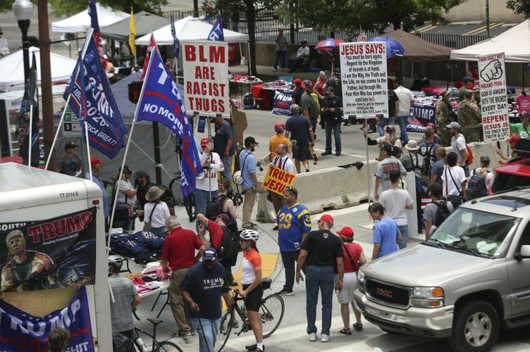 People gather as they make their way toward BOK Center