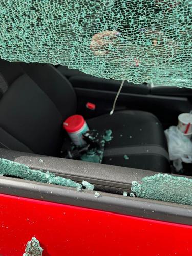 Douglas Kelley son's broken window.