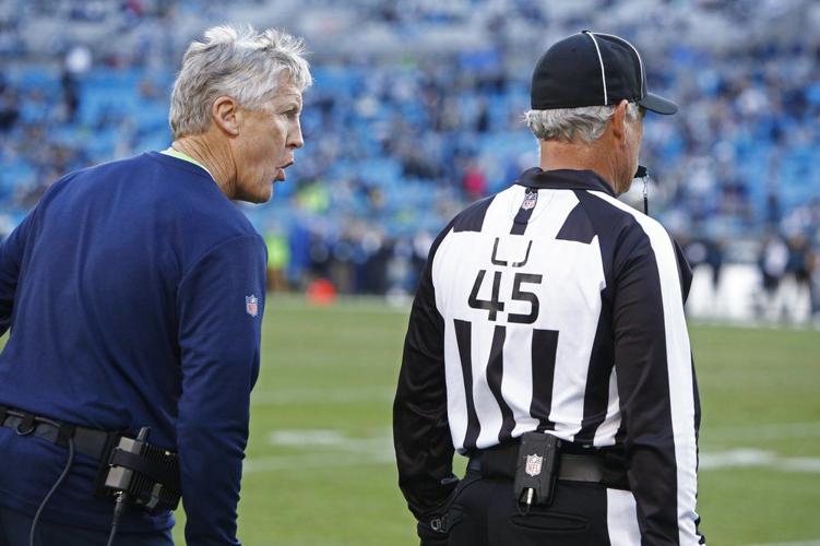 In season of Lamar and Russell, NFL officiating overshadows