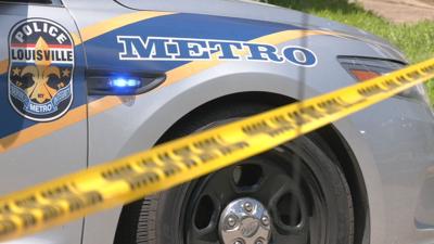 LOUISVILLE METRO POLICE - LMPD CRUISER - CRIME SCENE TAPE- DAYLIGHT 5-30-2024 2.jpeg