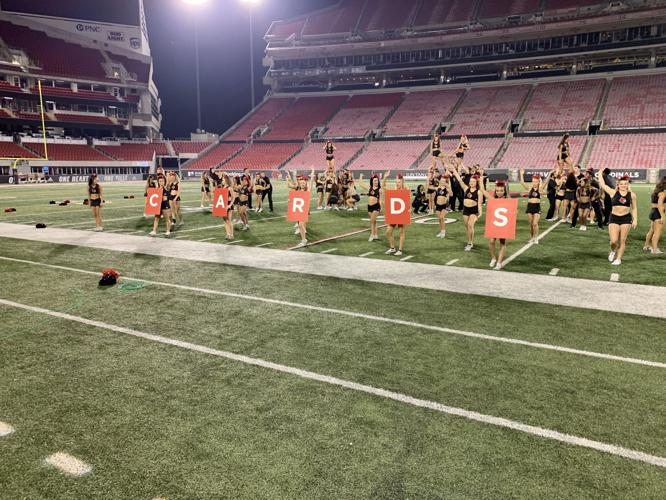 U of L Dance Team at Cardinal Stadium spells out Cards - 9-13-19.jpg
