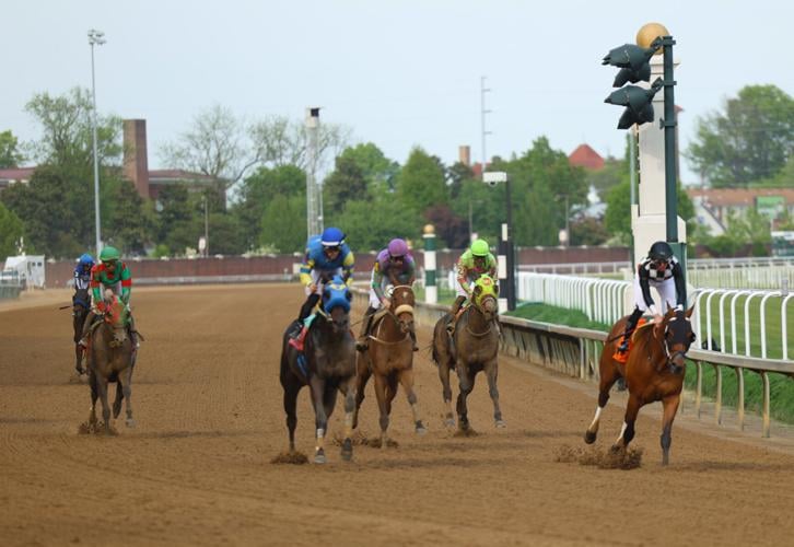 Horses finish after race at Churchill Downs.JPG
