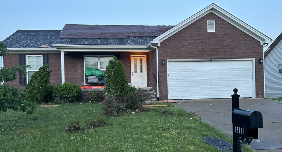 Tarp on home in Sellersburg, Indiana after May 7 tornado touchdown