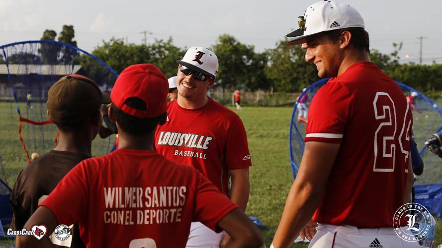 Louisville baseball players teach kids at camp in DR