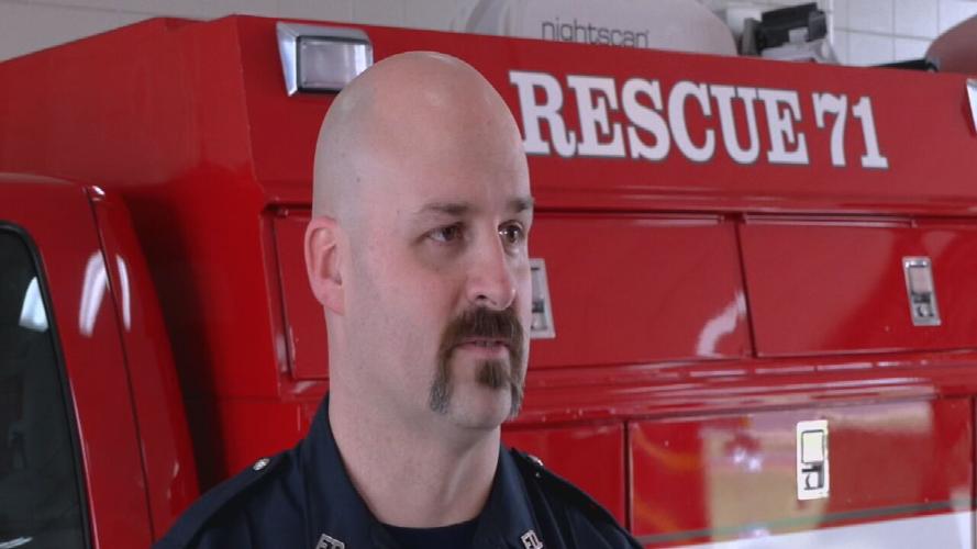 Firefighter saves kid.jpeg