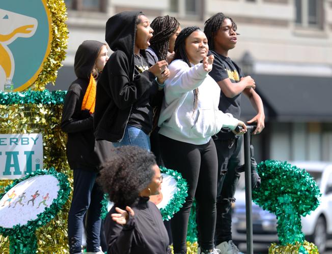 Group of teens wave to crowd.JPG