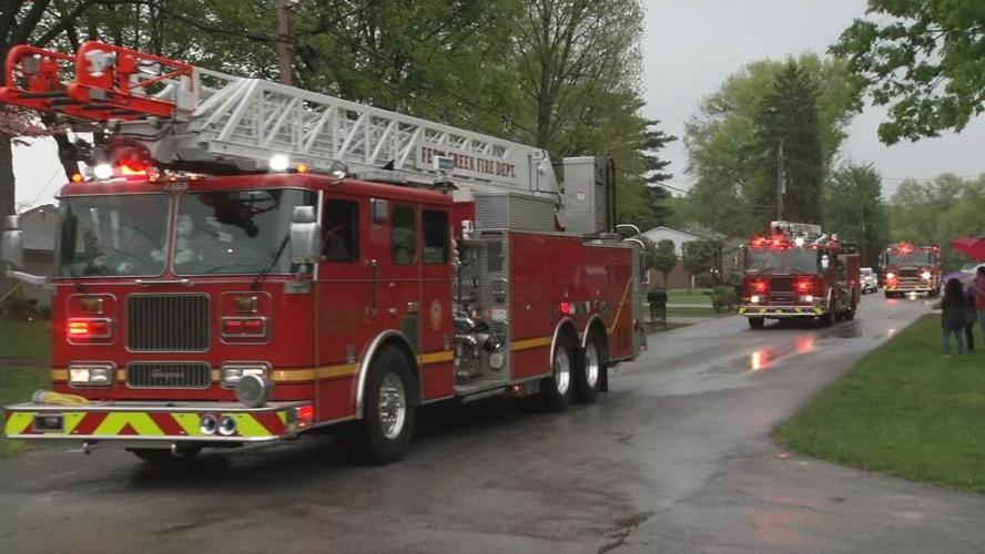 Fire trucks in wedding parade for Katie and Ryan Loveall