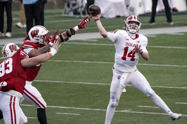 Indiana's Jack Tuttle throws a pass