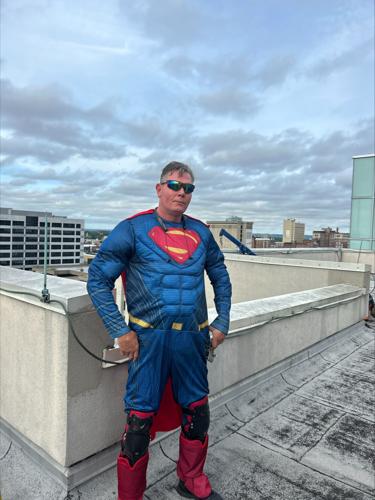 Window washers rappel from Norton Children's Hospital dressed as superheroes