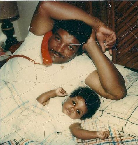 Charles Adams with young daughter