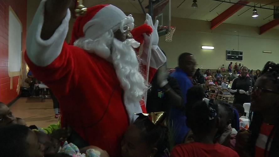 Santa visits hundreds of children at community event in Park Hill neighborhood