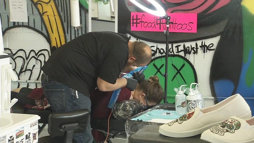 Southern Indiana food pantry and tattoo parlor team up to collect food in exchange for tattoos
