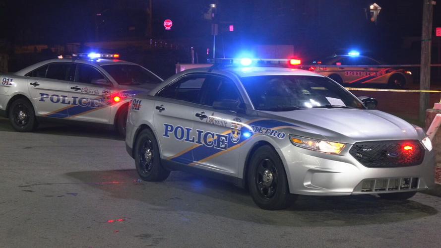 LMPD cruisers at homicide scene