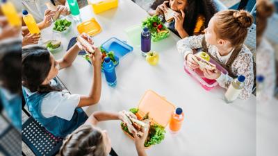 Kids eating school lunch
