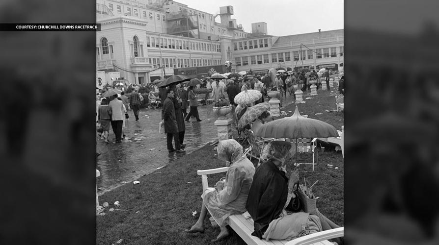 1967_Derby_048 – “Spectators sitting and walking through the plaza area on Kentucky Derby day.”
