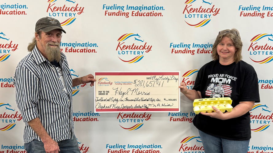 Hazel Morris and husband Dale with Lottery check