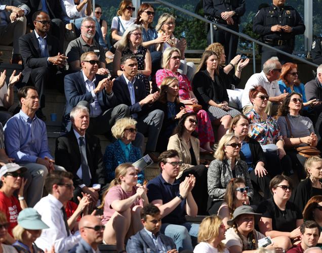Crowd claps during vigil.JPG