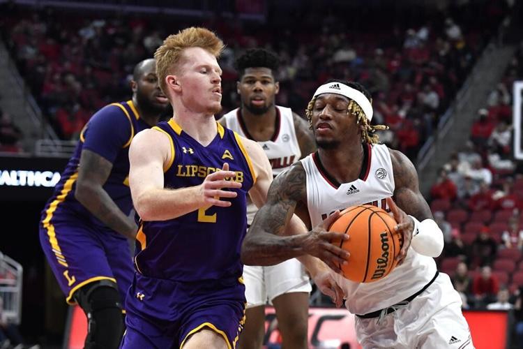 El Ellis drives into the lane.jpg