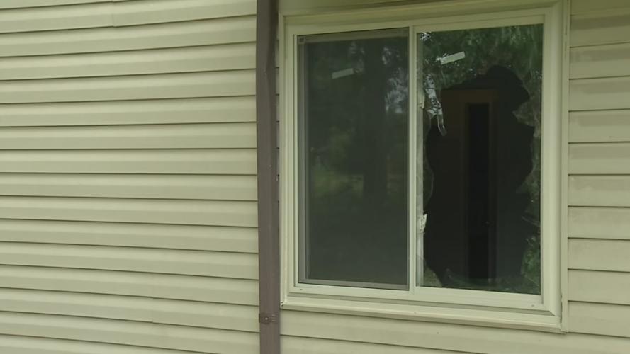 Broken window at Pin Oak Apartments in Radcliff after homicide 5-22-19