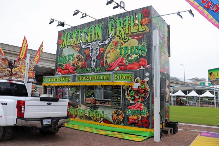Crews set up booths along the Ohio River one day before Thunder Over Louisville 2023
