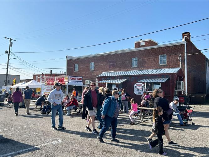 People walk around Seymour on April 7, 2024.jpeg