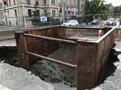 Sewer line cave-in closes portion of East Broadway in downtown Louisville