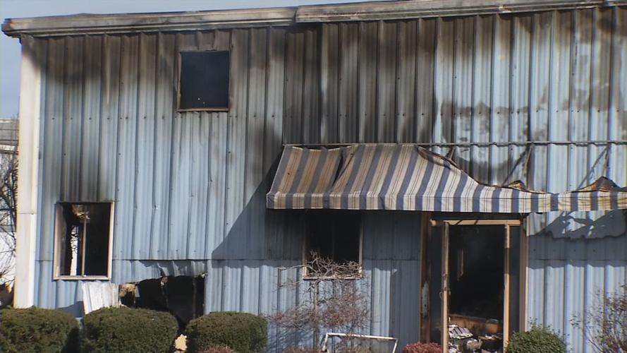Aftermath of fire at Wholesale Hardwood Interiors in Campbellsville