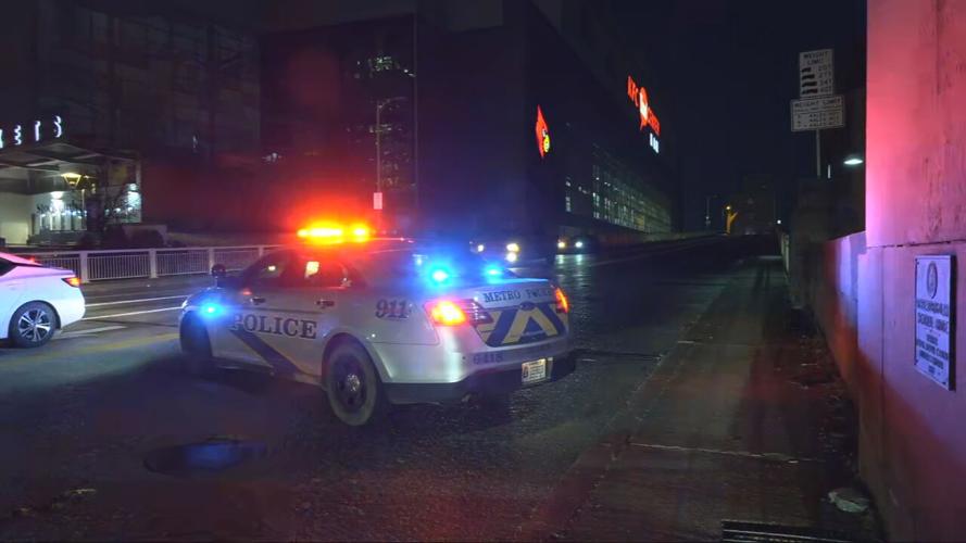 LMPD cruisers block 2nd Street Bridge in downtown Louisville after pedestrian struck