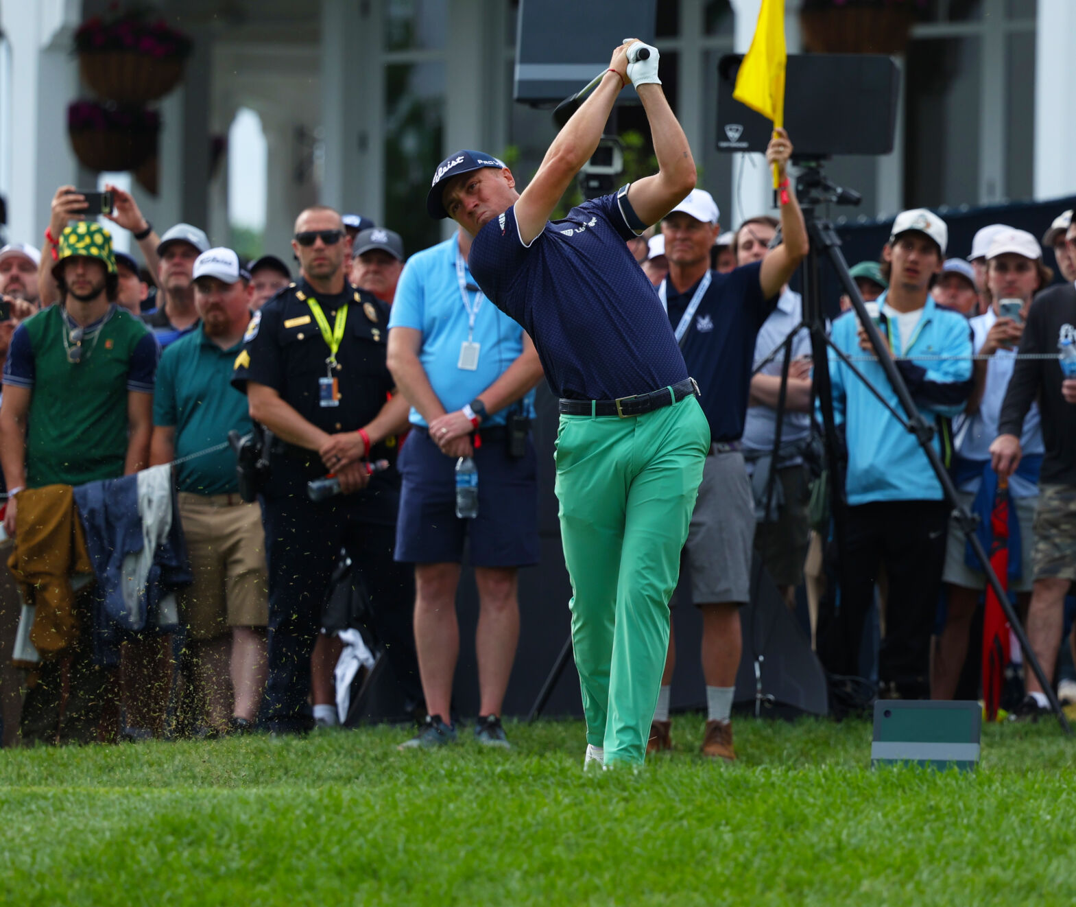Justin Thomas connects on 13th hole tee box.JPG