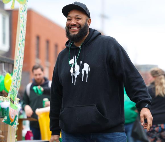 Chris Williams with Four Pegs at St. Patrick's Day Parade.JPG