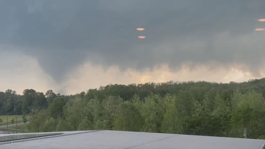 Apparent funnel cloud forming in video from WDRB Viewer