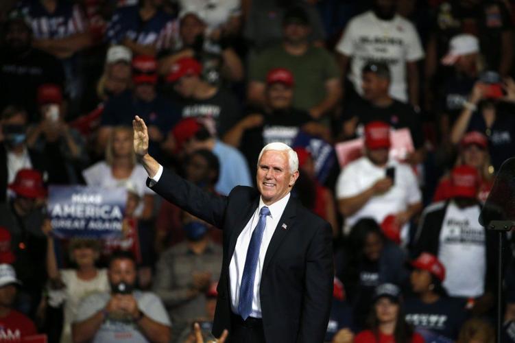 Vice President Mike Pence waves to the crowd during a campaign rally in Tulsa, Okla