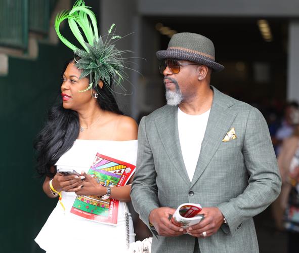 Couple searches for seats at Churchill Downs.JPG